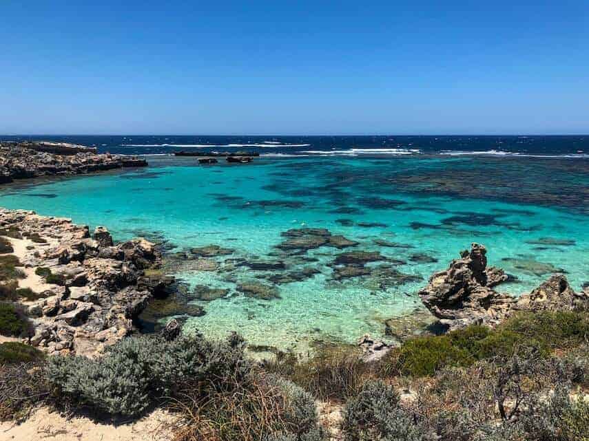 Clear blue water next to a rocky coast at Rottnest Island