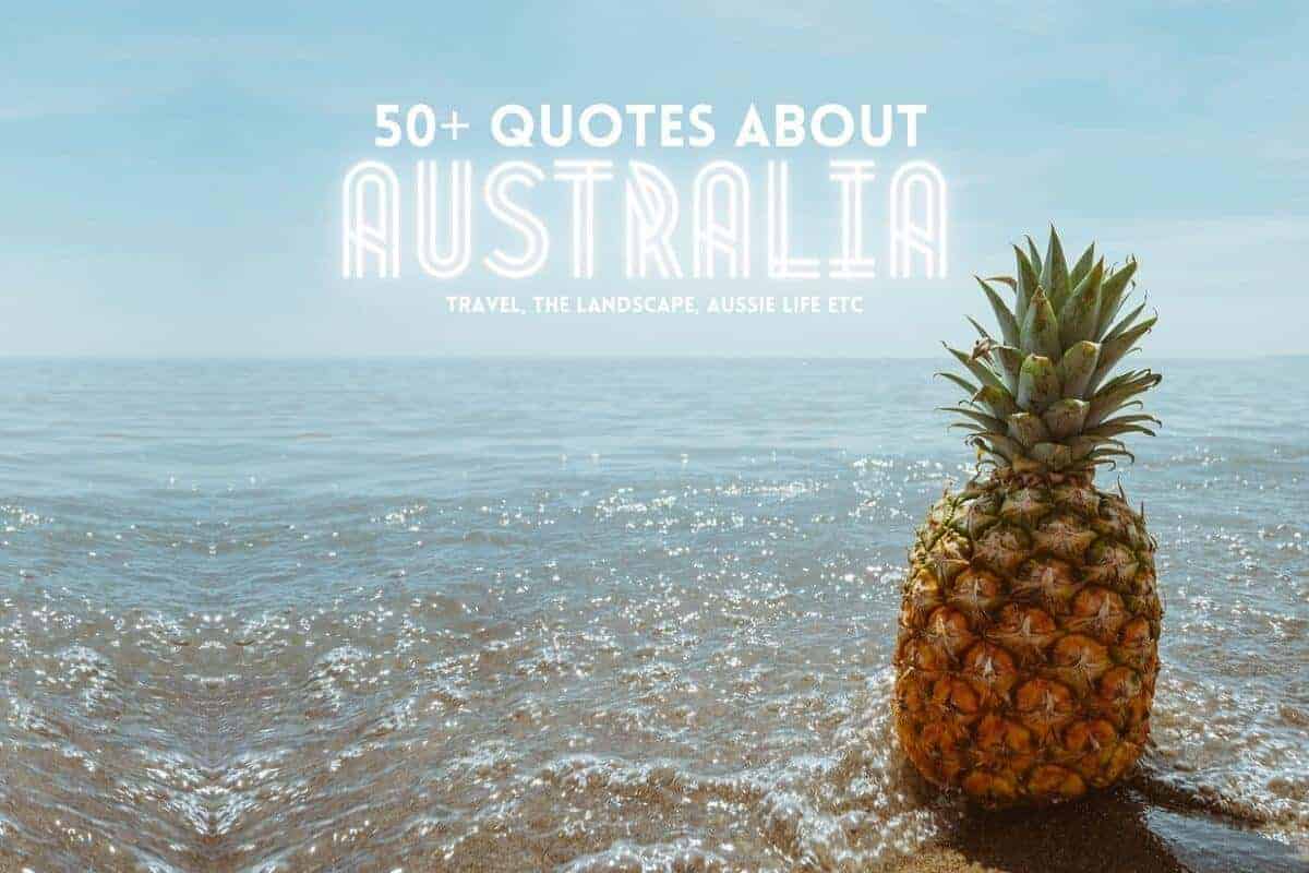 50+ Quotes about Australia header image of a pineapple standing up on the beach with the ocean lapping around it's base