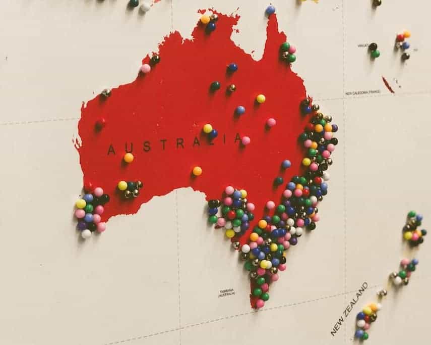 Map of Australia with hundreds of coloured push pins covered lots of different points