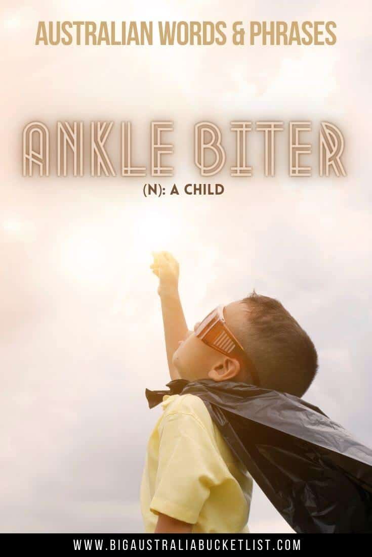 Australian Slang Phrase - Ankle Biter = A Child (featuring a child wearing glasses and a cape with one arm in the air superman style with text overlay above with the translation)
