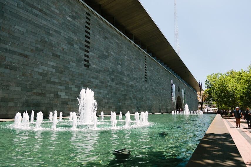 Fountains outside the greay brick National Gallery of Victoria (NGV)