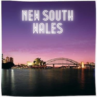 Link Tile to New South Wales Category - image of Sydney Opera House and Harbour Bridge under a purple and pink sunset sky