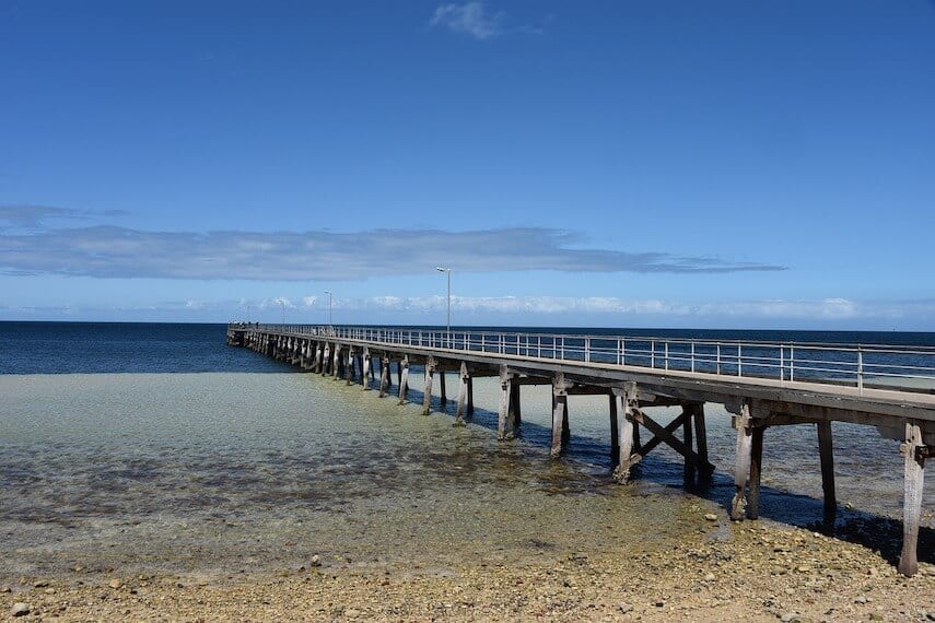 Wooden pier leading out into the ocean at Wool Bay on the Yorke Peninsula