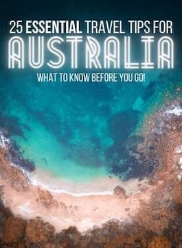 25 Essential Australia Travel Tips link tile top down view of the ocean with a curved sandy coastline