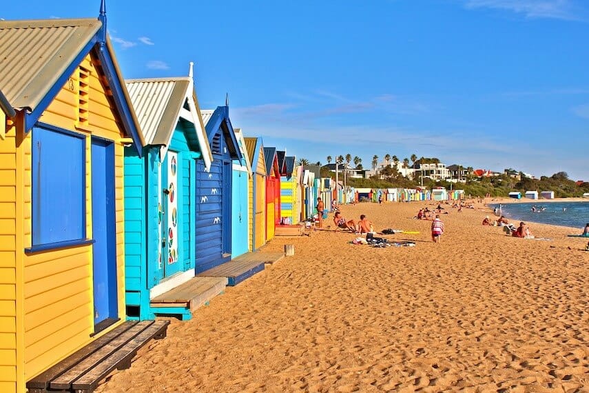 Best Time To Visit Melbourne Australia is in Summer - Colourful bathing boxes on the beach at Brighton