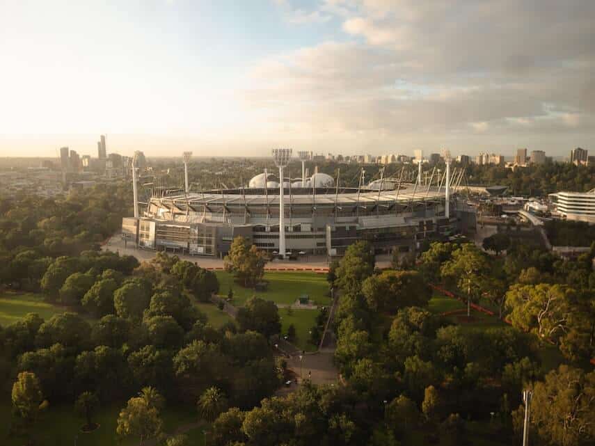 Aerial shot of MCG with Melbourne City in the background