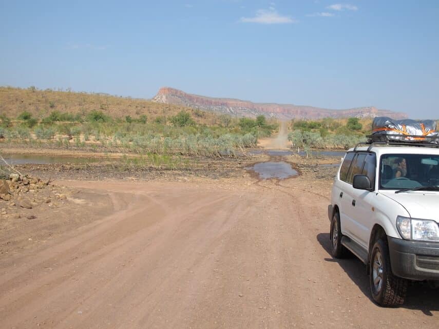 White 4x4 Car driving towards the camera on the unsealed, dirt, Gibb River Road
