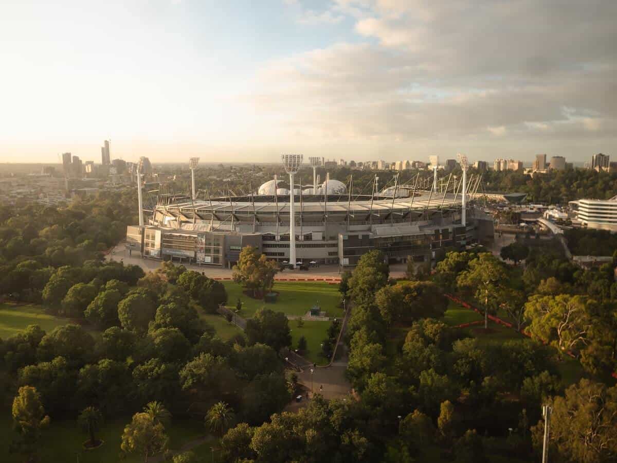 Australian Sport Trivia Questions - MCG from above with Melbourne city skyline in the background