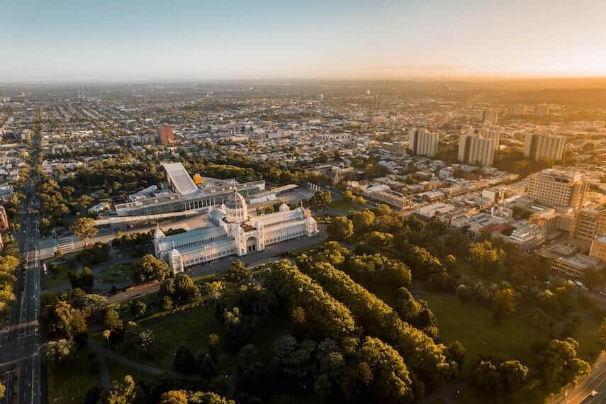 Royal Exhibition Building surrounded by Green Carlton Gardens as seen from above
