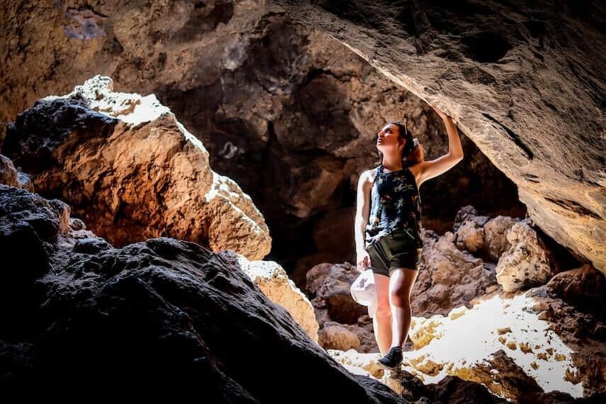 Woman standing in Budj Bim Lava Tubes